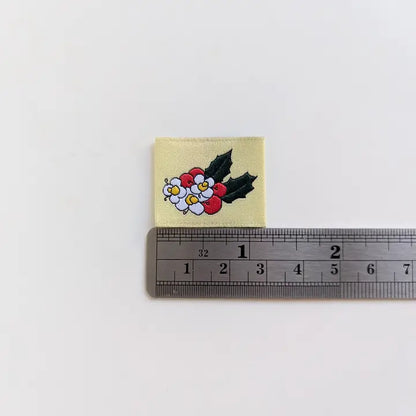 Garment Labels: December Birth Flowers - Holly