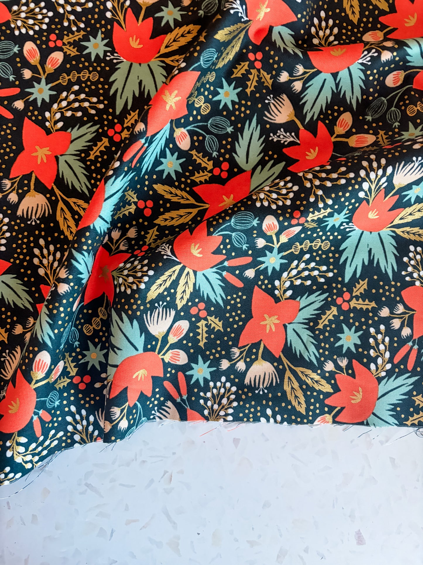 Holiday Classic Poinsettia Cotton Fabric in Evergreen Metallic