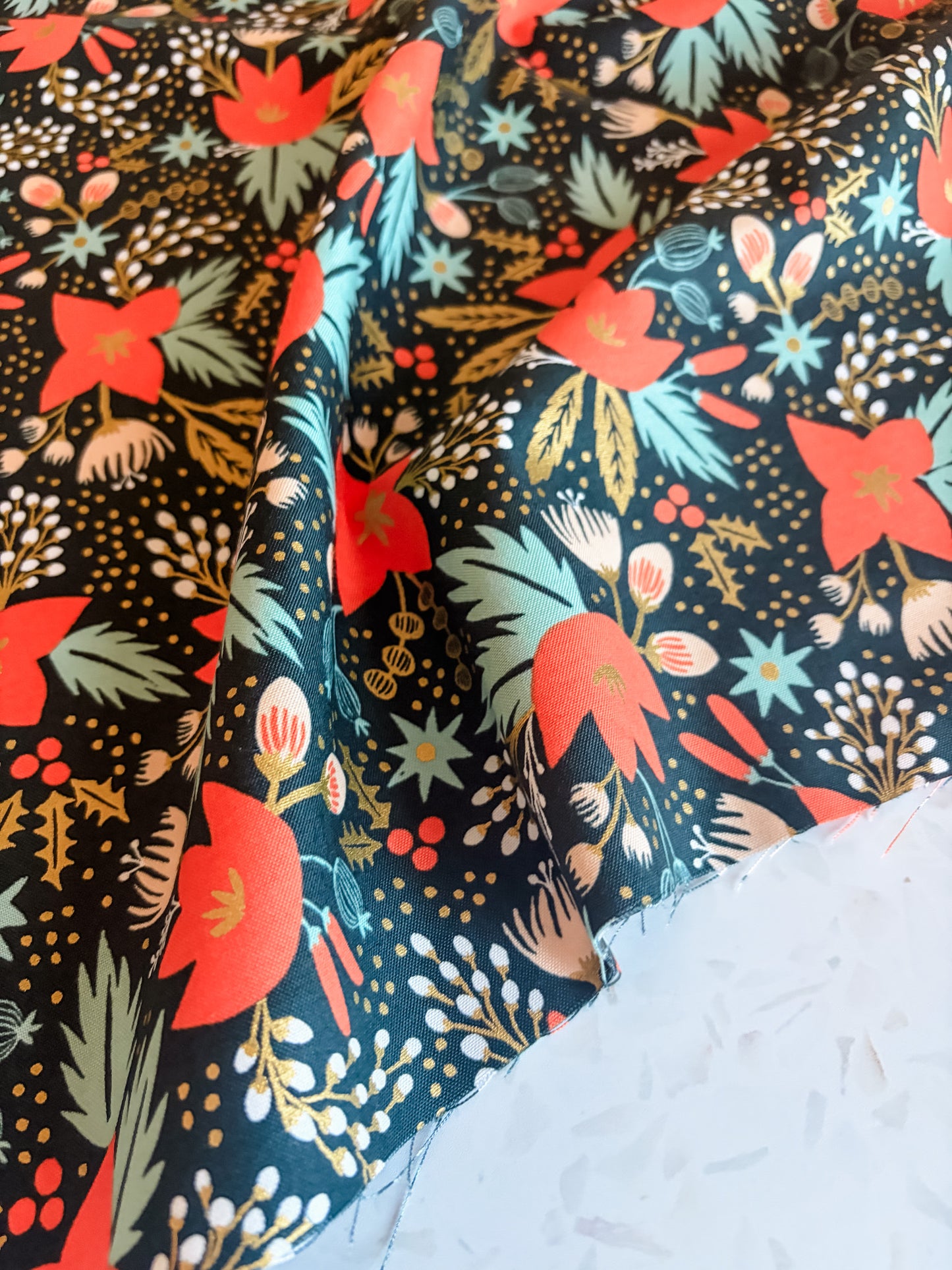 Holiday Classic Poinsettia Cotton Fabric in Evergreen Metallic