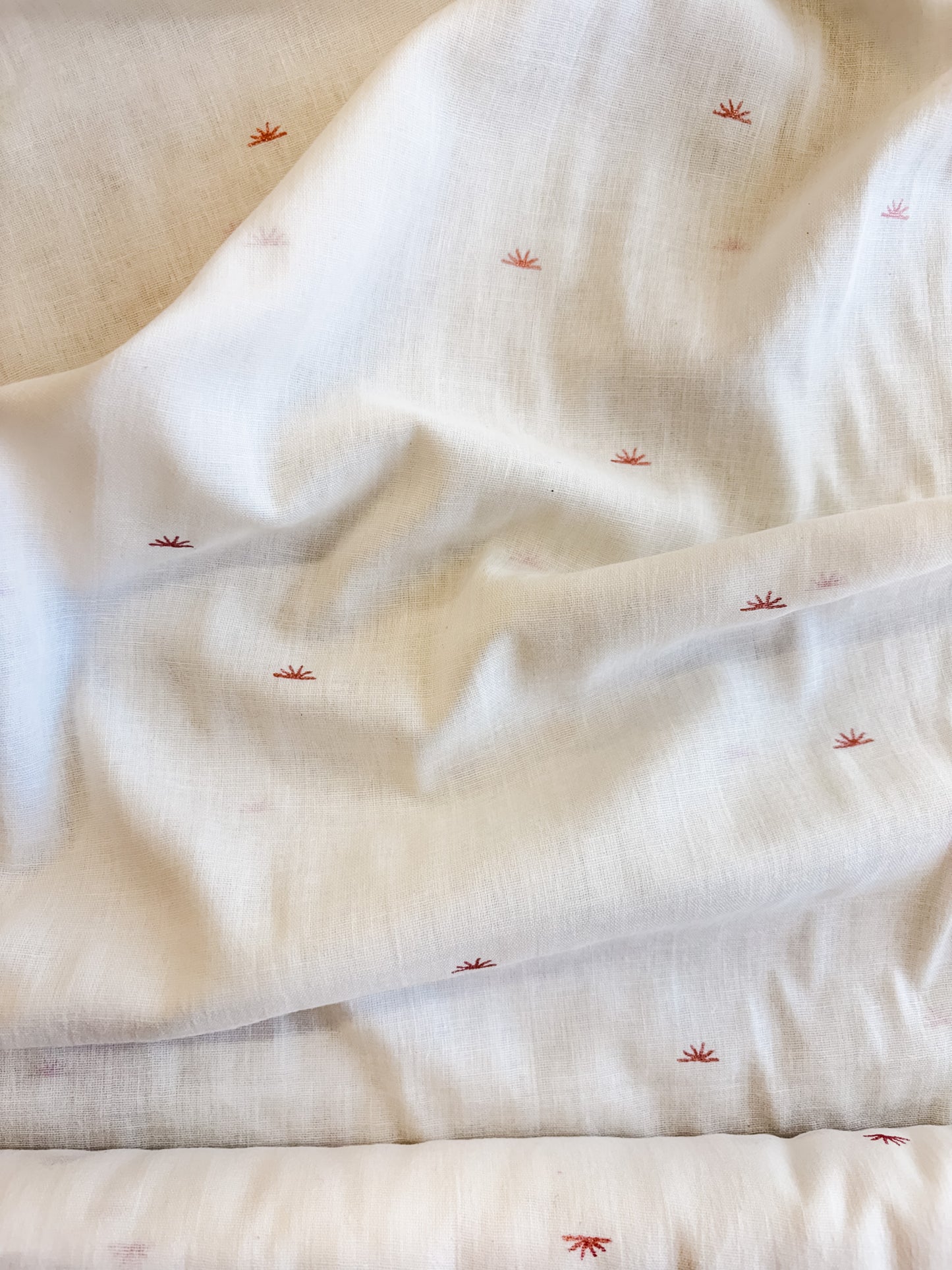 Sunset Cotton Crepe Fabric in Off-White