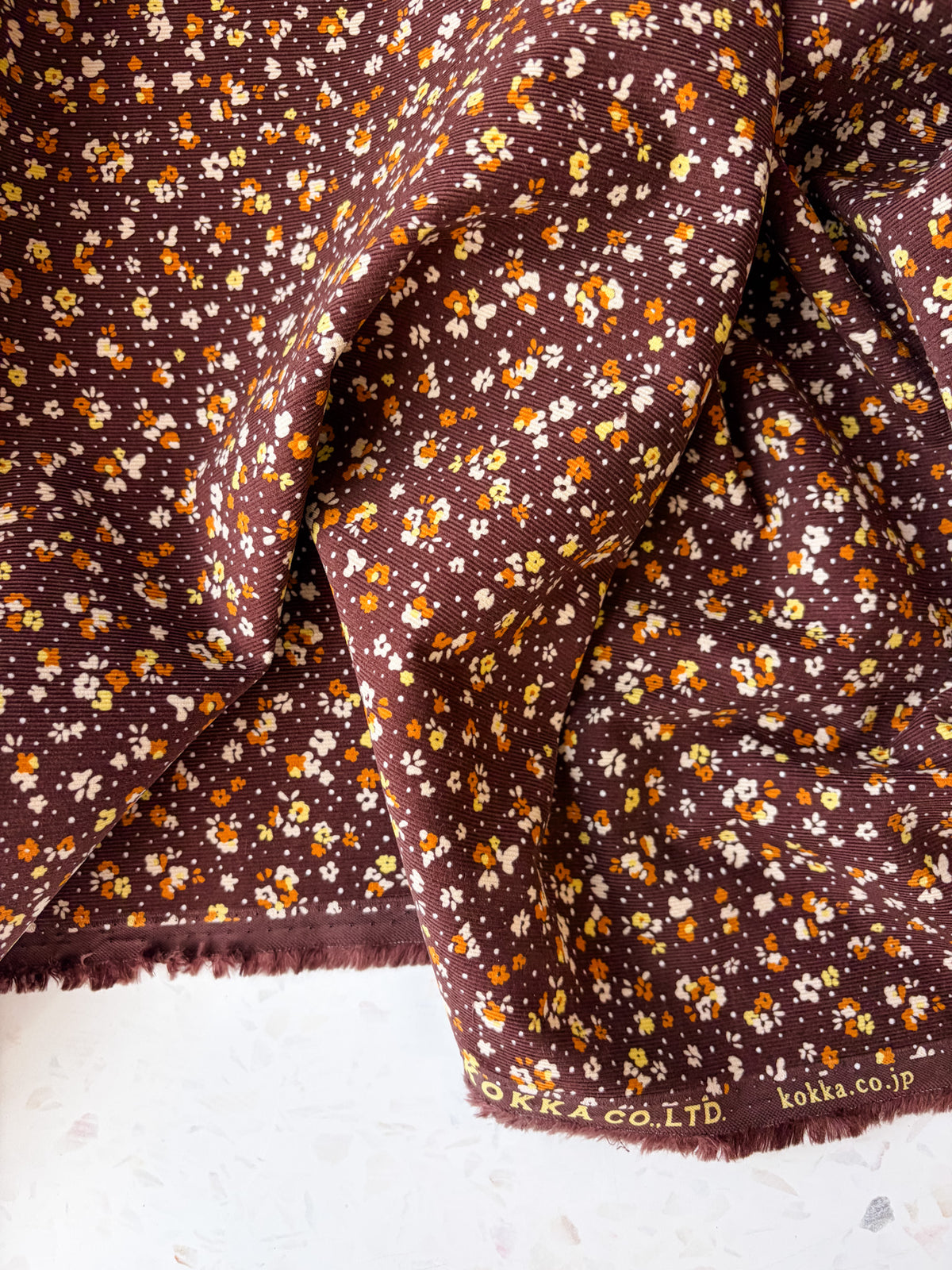 KOKKA Petite Pinwale Corduroy | Ditsy Floral in Chocolate